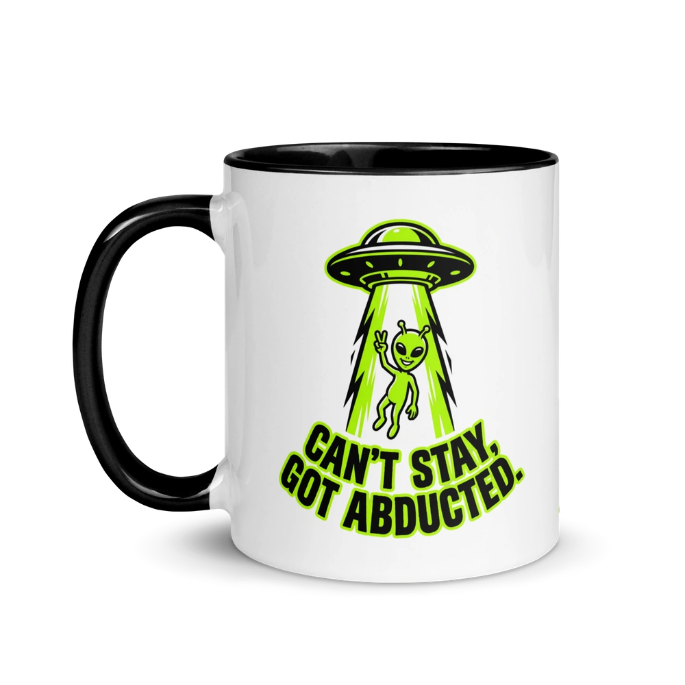 Mug with alien abduction design and text on a white background