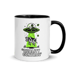 Mug with alien and cow under a UFO design on a white background